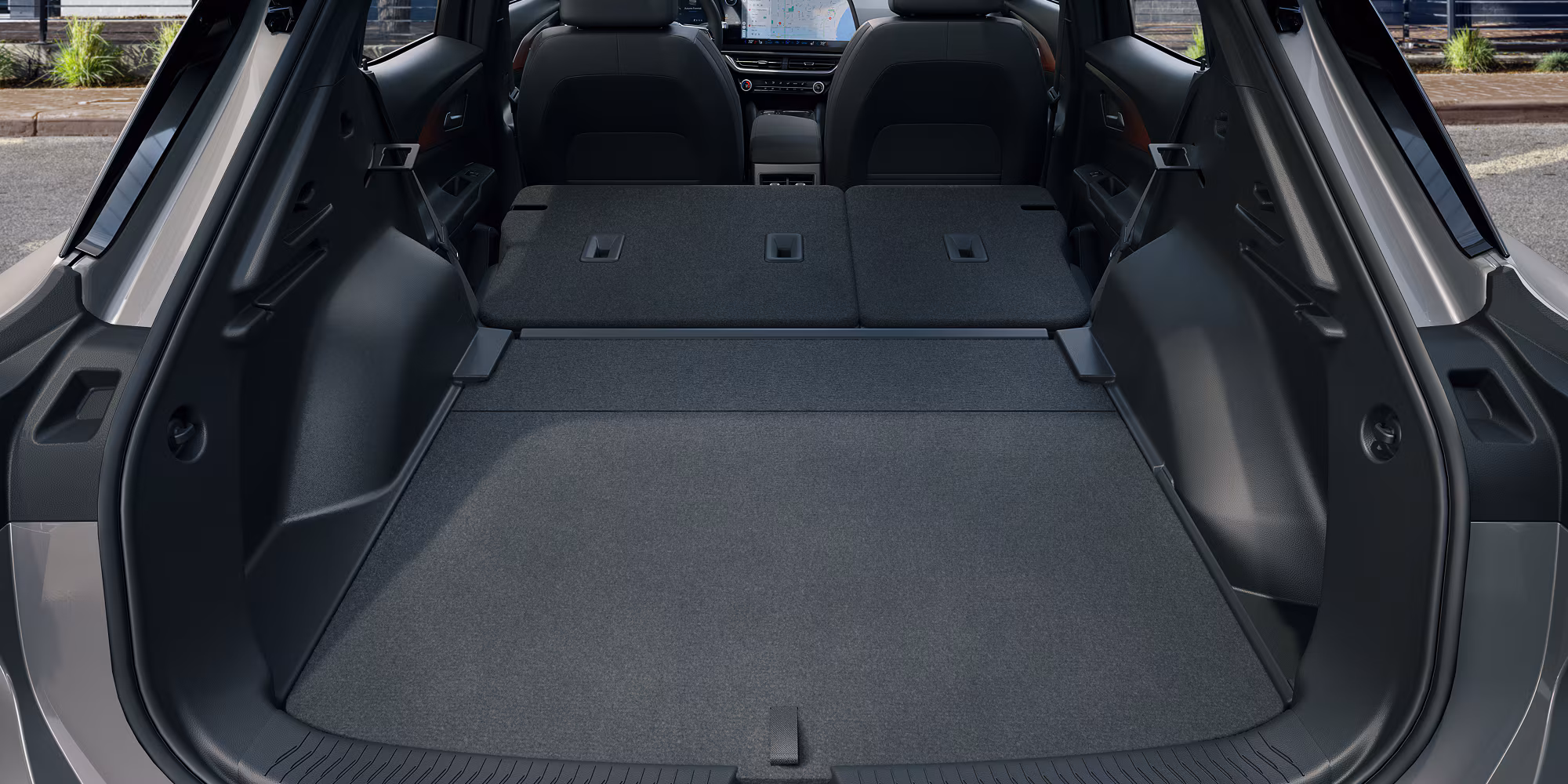 Interior Second Row Folded Down In The Trunk Of The 2026 Chevy Equinox Ev