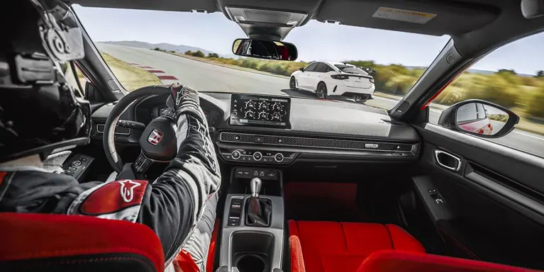 Interior Interior View Of A 2026 Honda Civic Type R Driving On A Race Track Chasing A 2026 Ho